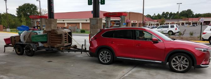 Mazda CX-9 towing a utility trailer