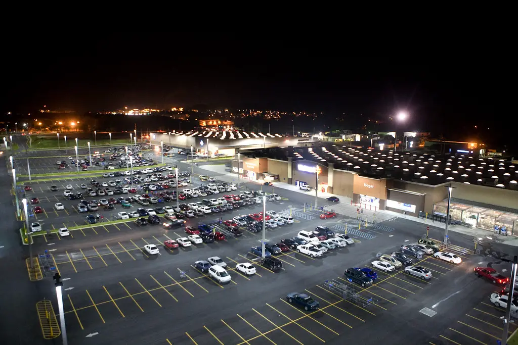 brightly lit parking lot