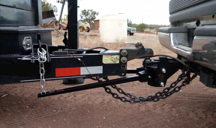 weight distribution hitch hooked up to truck and trailer