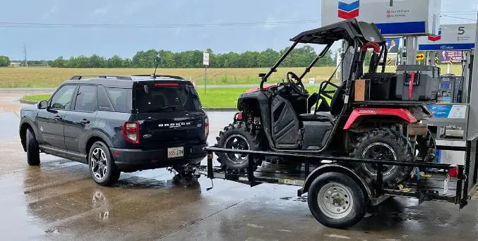 Ford Bronco Towing An ATV Trailer