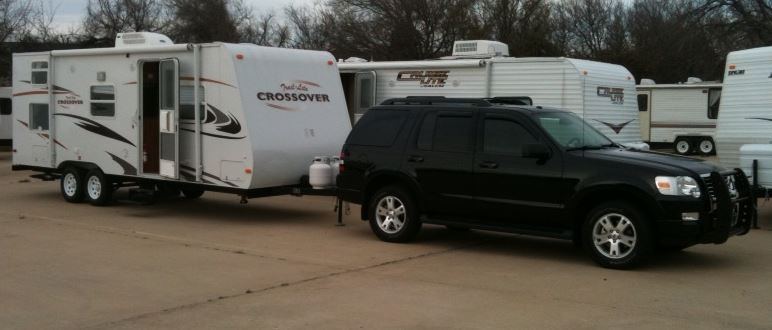 Ford Explorer towing a travel trailer