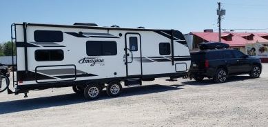 Tahoe towing a travel trailer