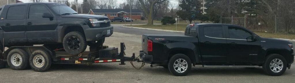 chevy colorado towing a vehicle trailer