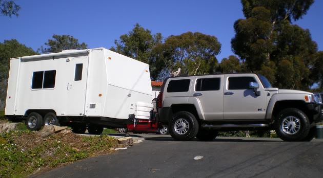 Hummer H3 towing a travel trailer