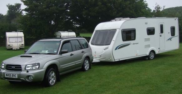 subaru forester towing a travel trailer