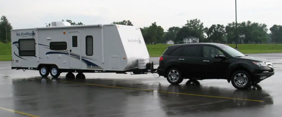 Acura RDX towing a travel trailer