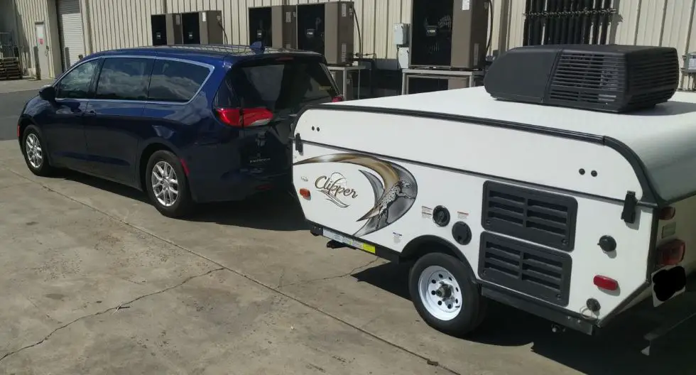 Chrysler Pacifica towing a pop up camper