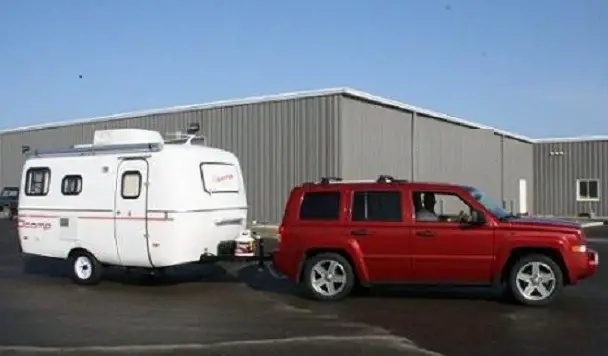 Jeep Patriot towing a Scamp Travel Trailer