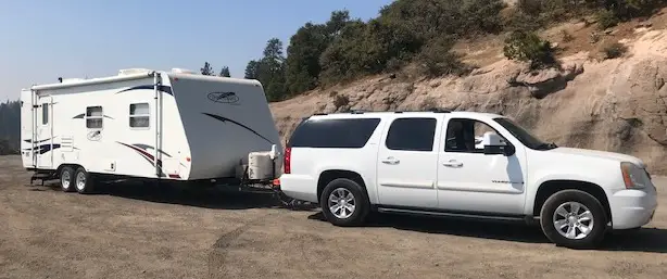 chevy suburban towing a travel trailer