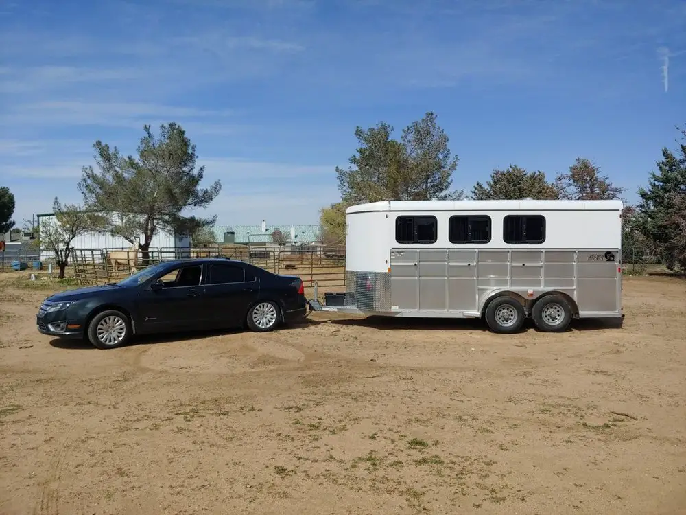 ford fusion towing a horse trailer