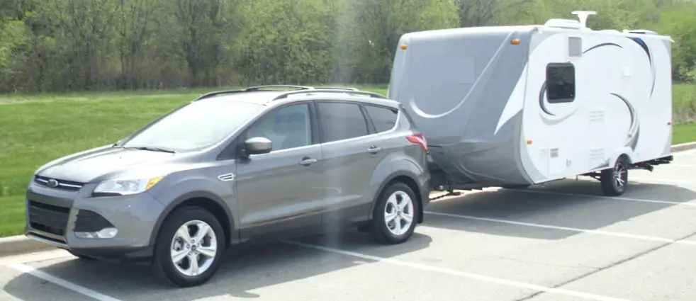 ford escape towing a travel trailer
