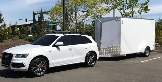 audi sq5 towing a cargo trailer